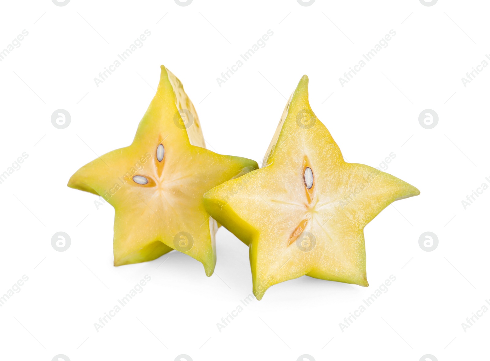 Photo of Slices of ripe carambola on white background. Exotic fruit