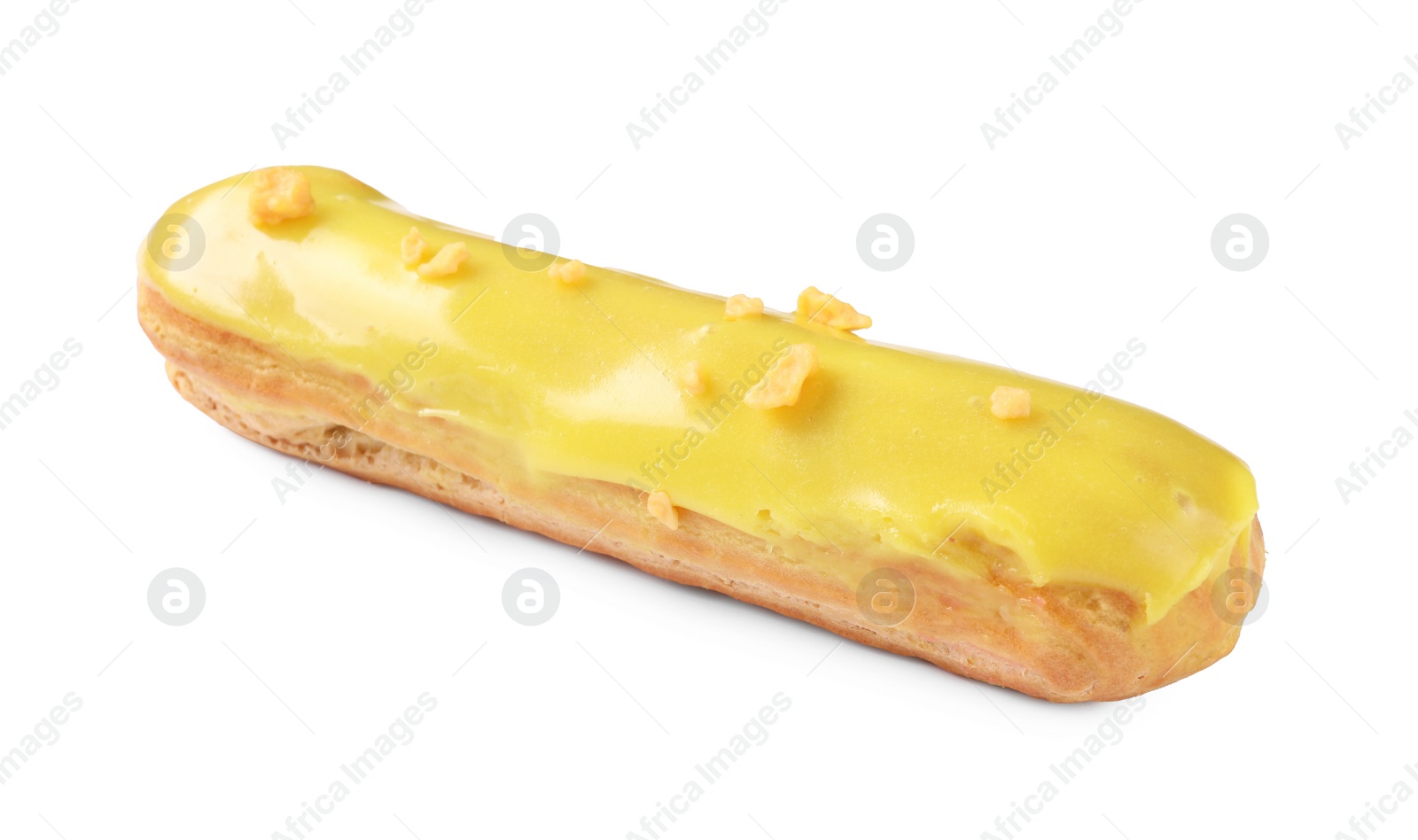 Photo of Delicious eclair covered with yellow glaze isolated on white