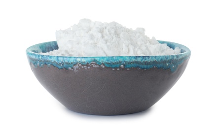 Bowl with corn starch on white background