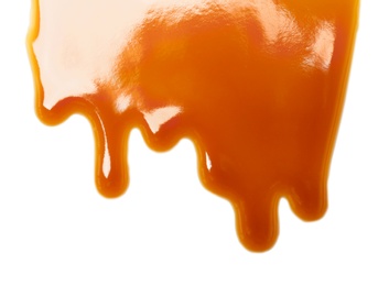 Delicious caramel sauce on white background