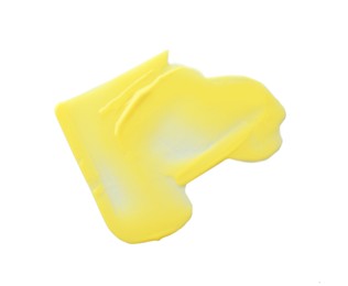 Photo of Yellow paint sample on white background, top view