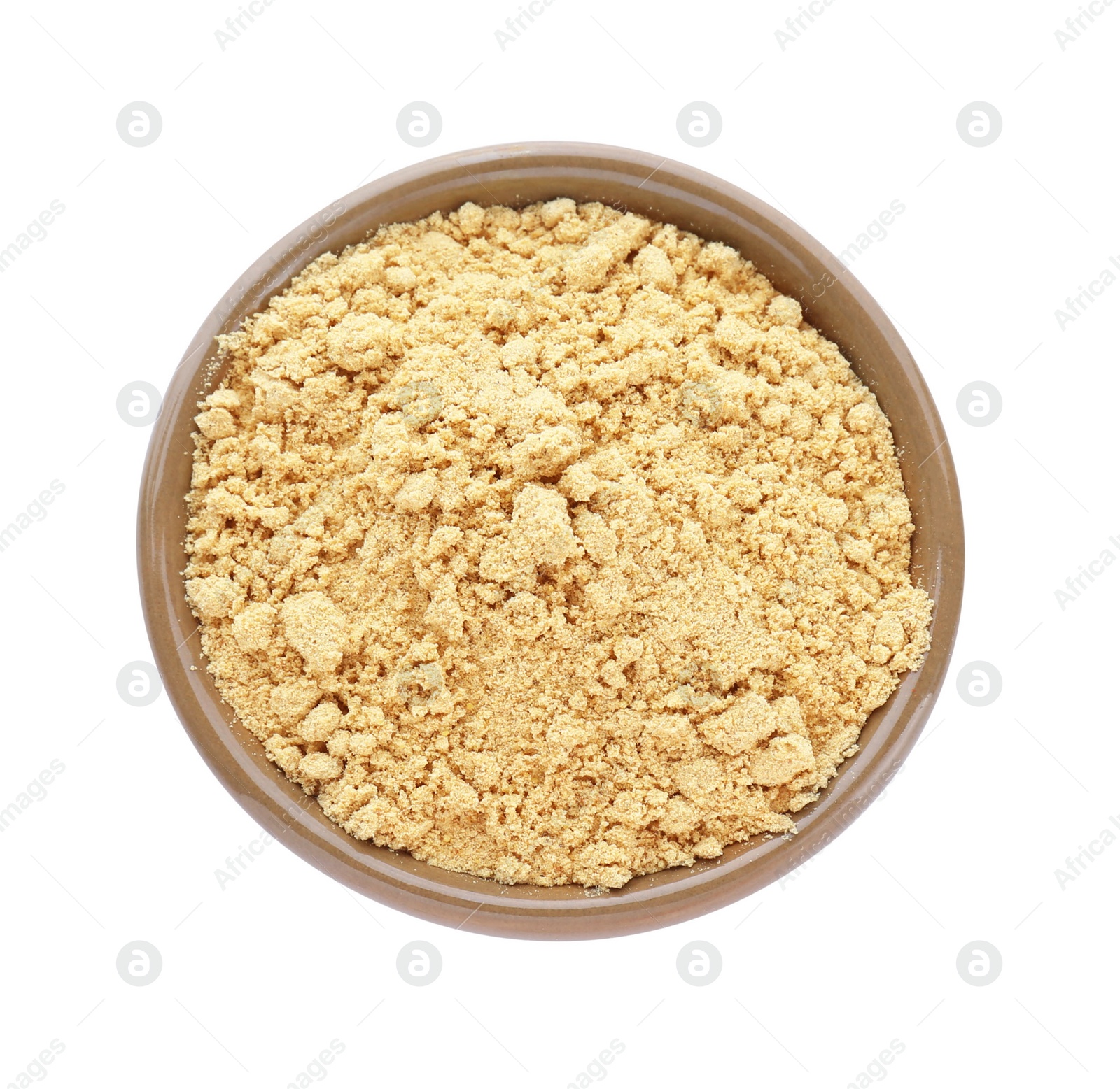 Photo of Aromatic mustard powder in bowl on white background, top view