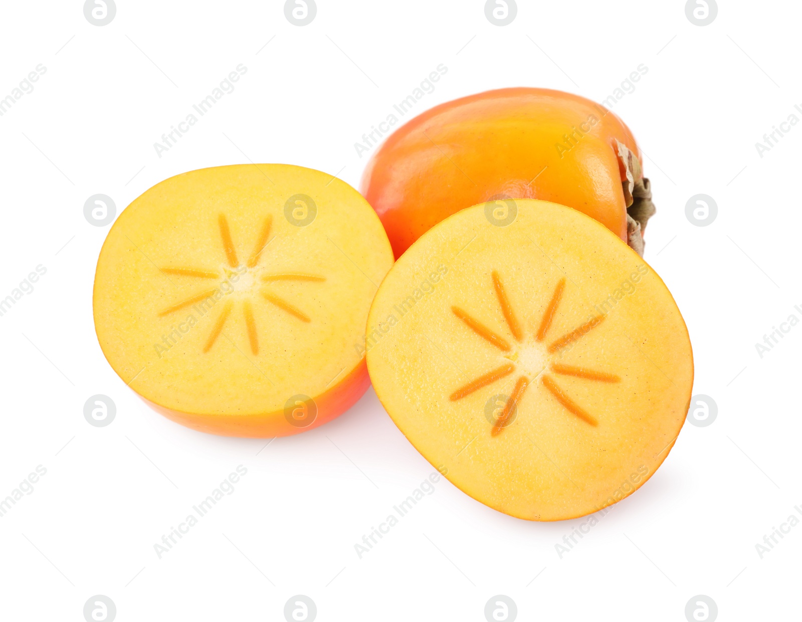 Photo of Whole and cut persimmon fruits isolated on white, top view