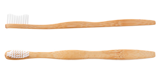 Image of Bamboo toothbrushes with soft bristles on white background 