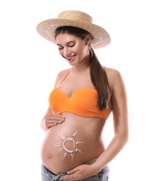 Young pregnant woman with sun protection cream on belly against white background