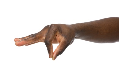 African-American man holding something in hand on white background, closeup