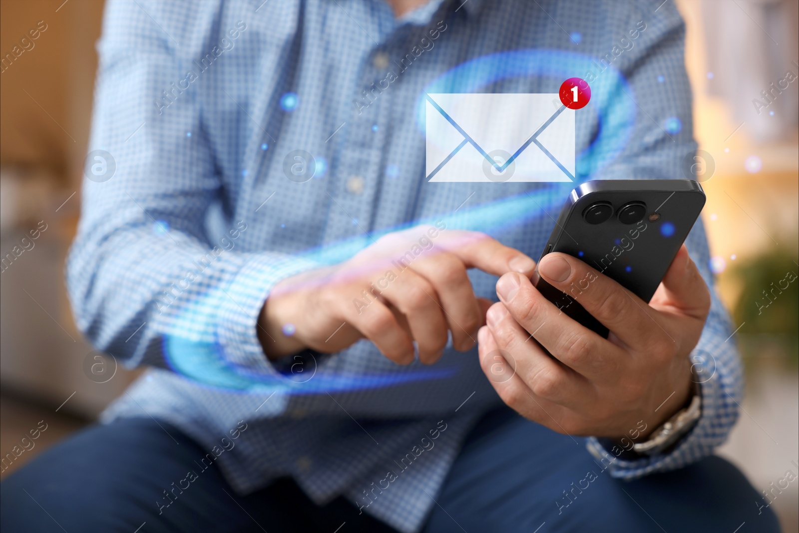 Image of Email. Man using mobile phone, closeup. Letter illustration over device