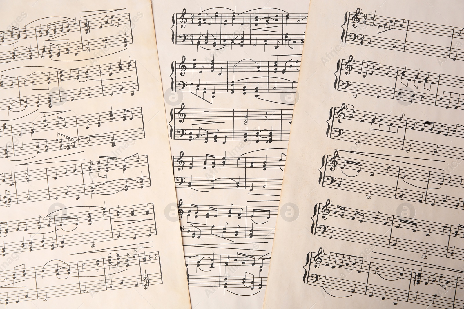 Photo of Sheets of paper with different notes as background, top view