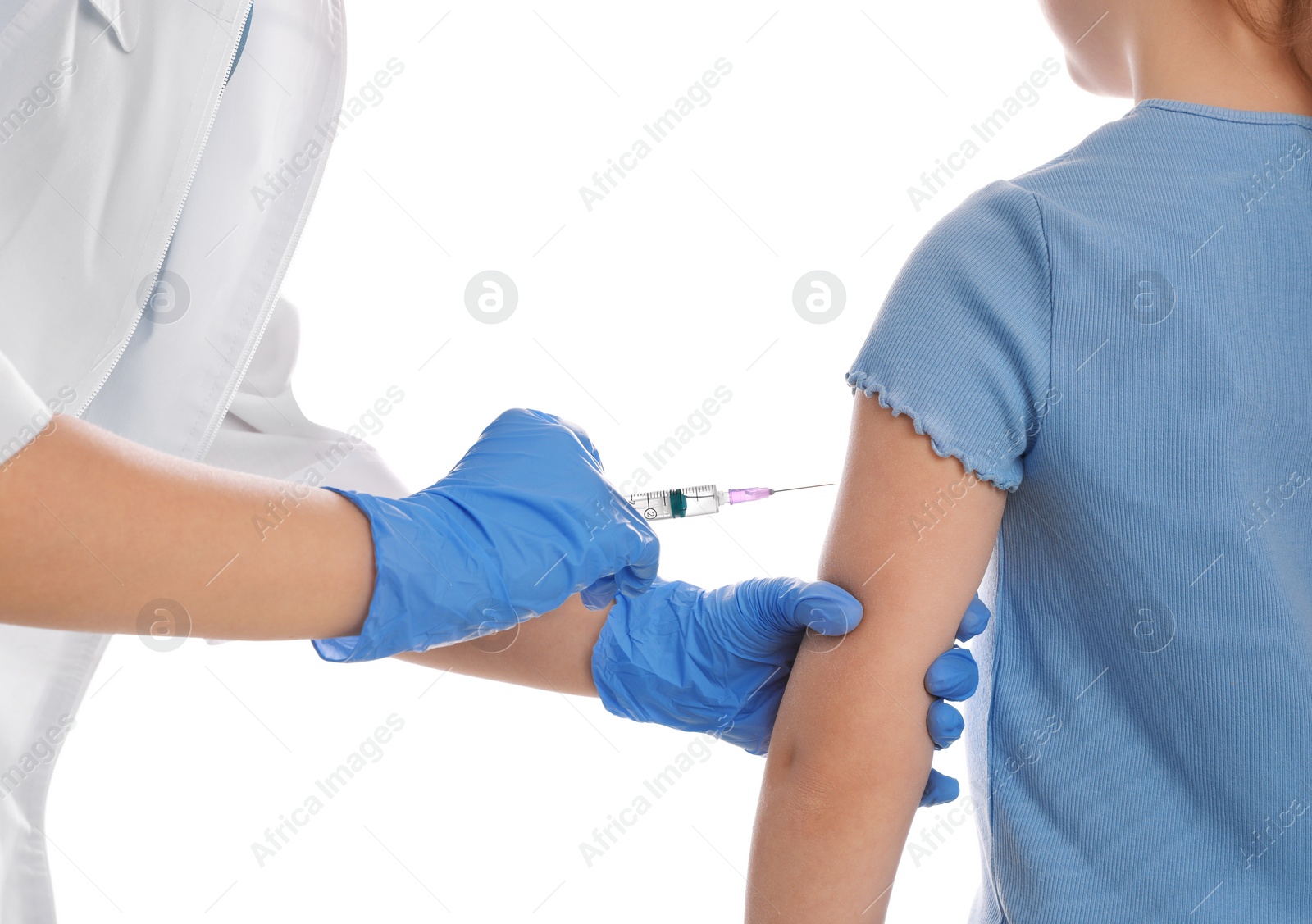 Photo of Little girl receiving chickenpox vaccination on white background, closeup. Varicella virus prevention