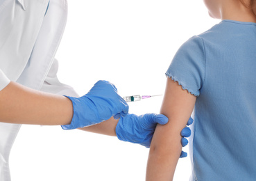 Photo of Little girl receiving chickenpox vaccination on white background, closeup. Varicella virus prevention