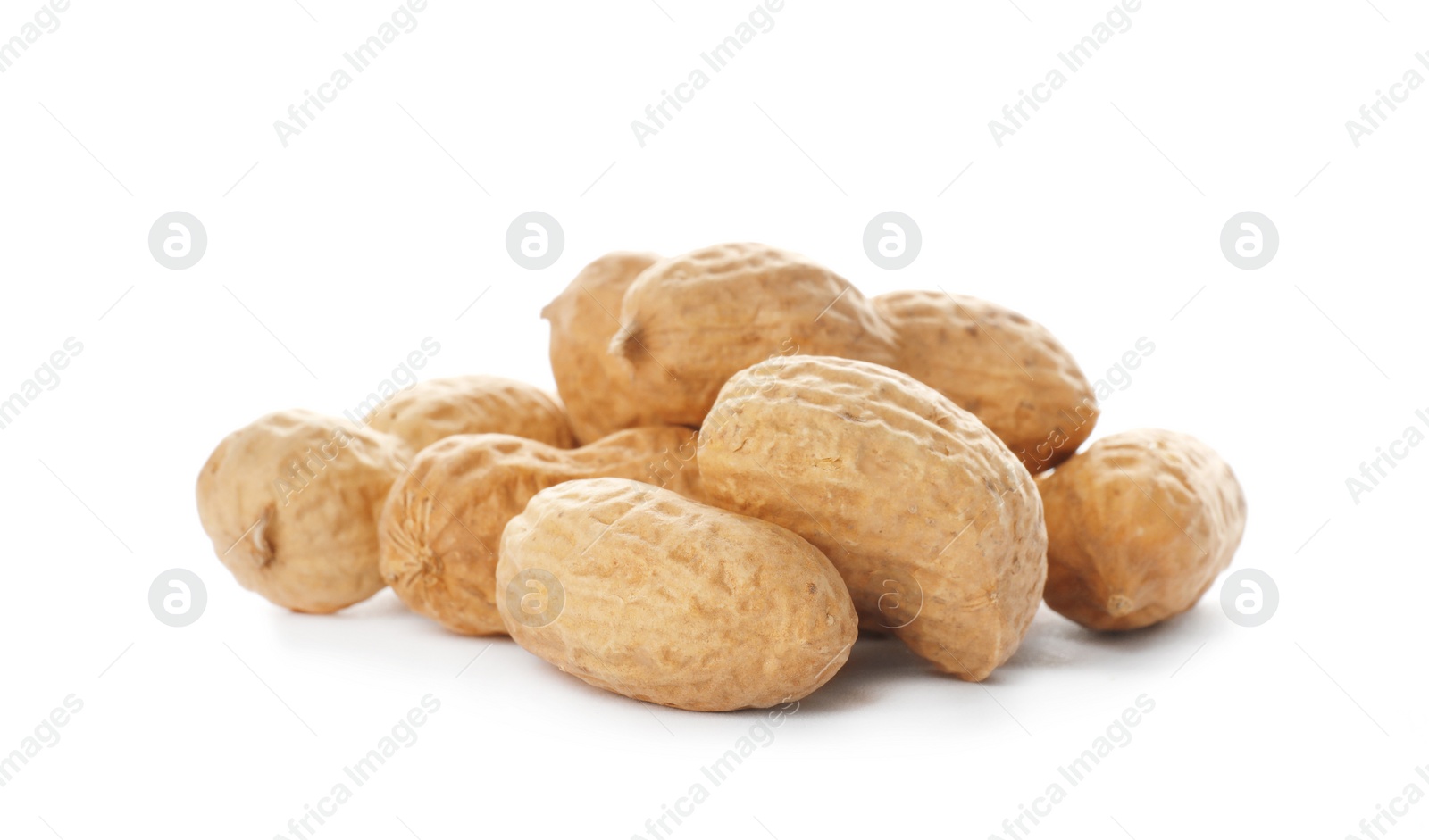 Photo of Raw peanuts in pods on white background