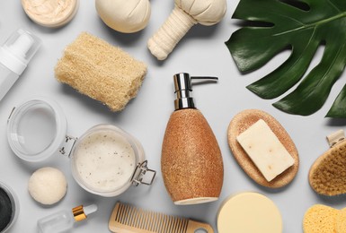 Photo of Bath accessories. Flat lay composition with personal care products on light grey background