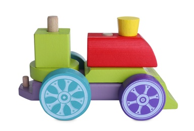 Photo of Colorful wooden toy locomotive isolated on white