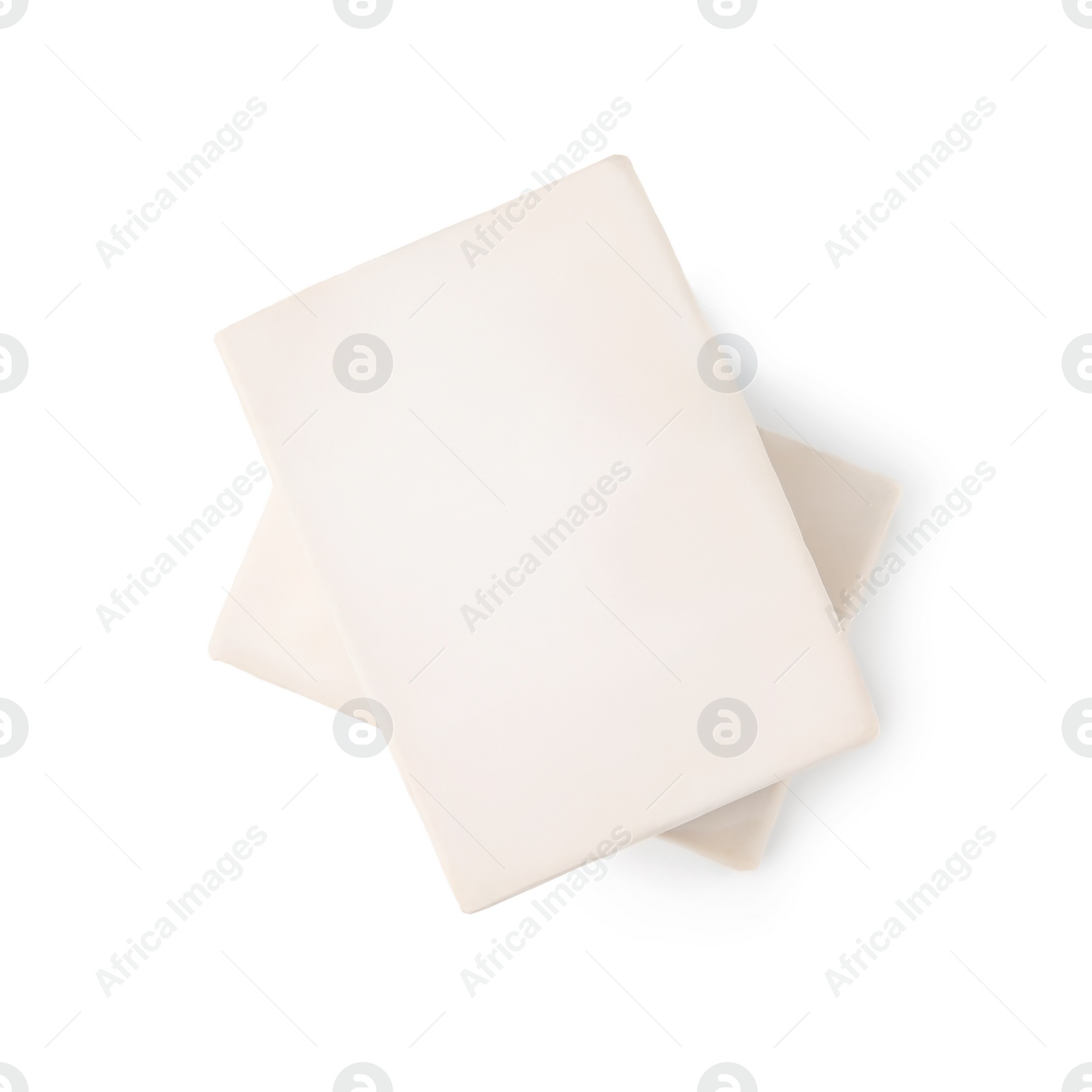 Photo of Blocks of compressed yeast on white background, top view