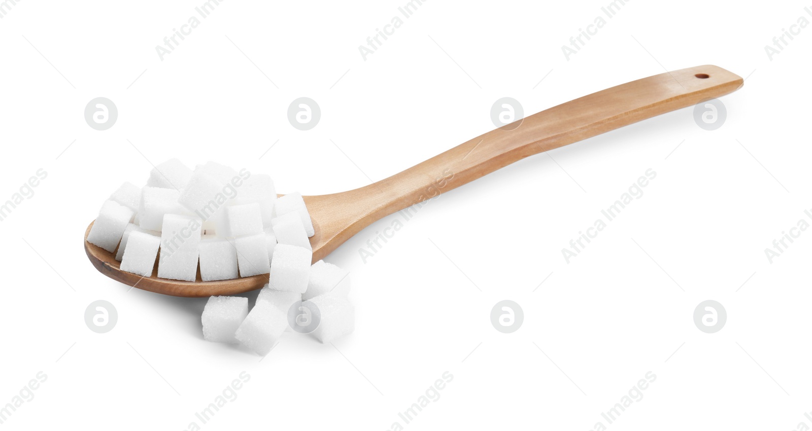 Photo of Sugar cubes and wooden spoon isolated on white