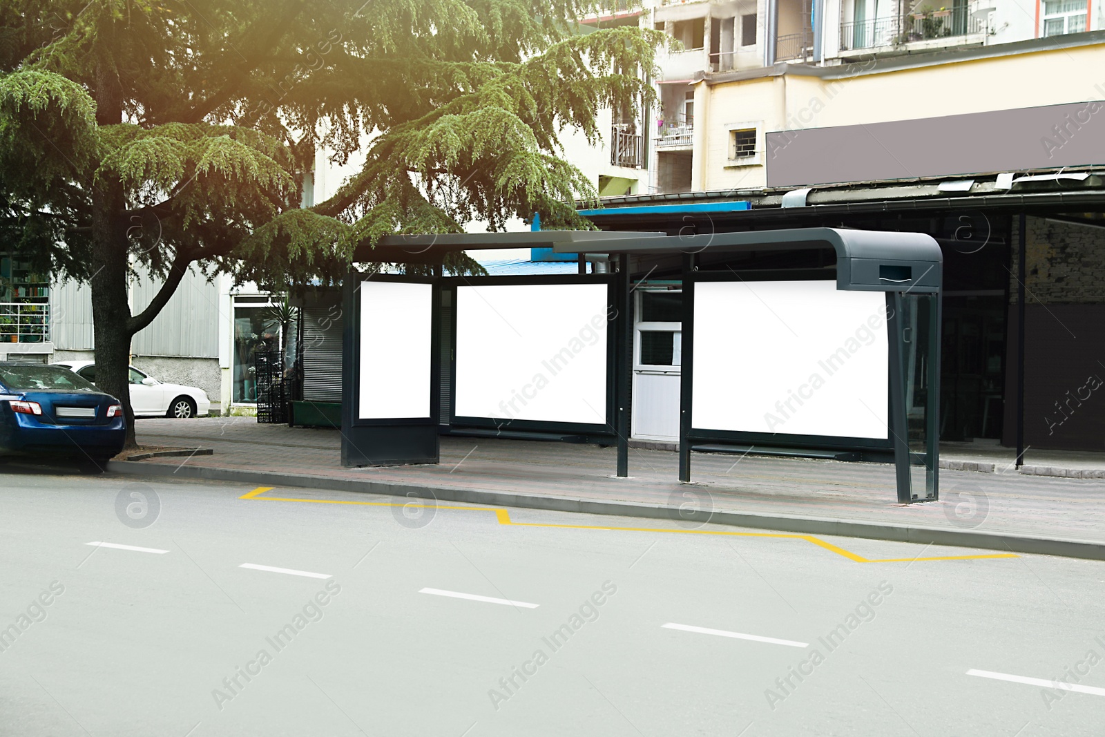 Photo of Blank advertising boards on transport stop. Space for design