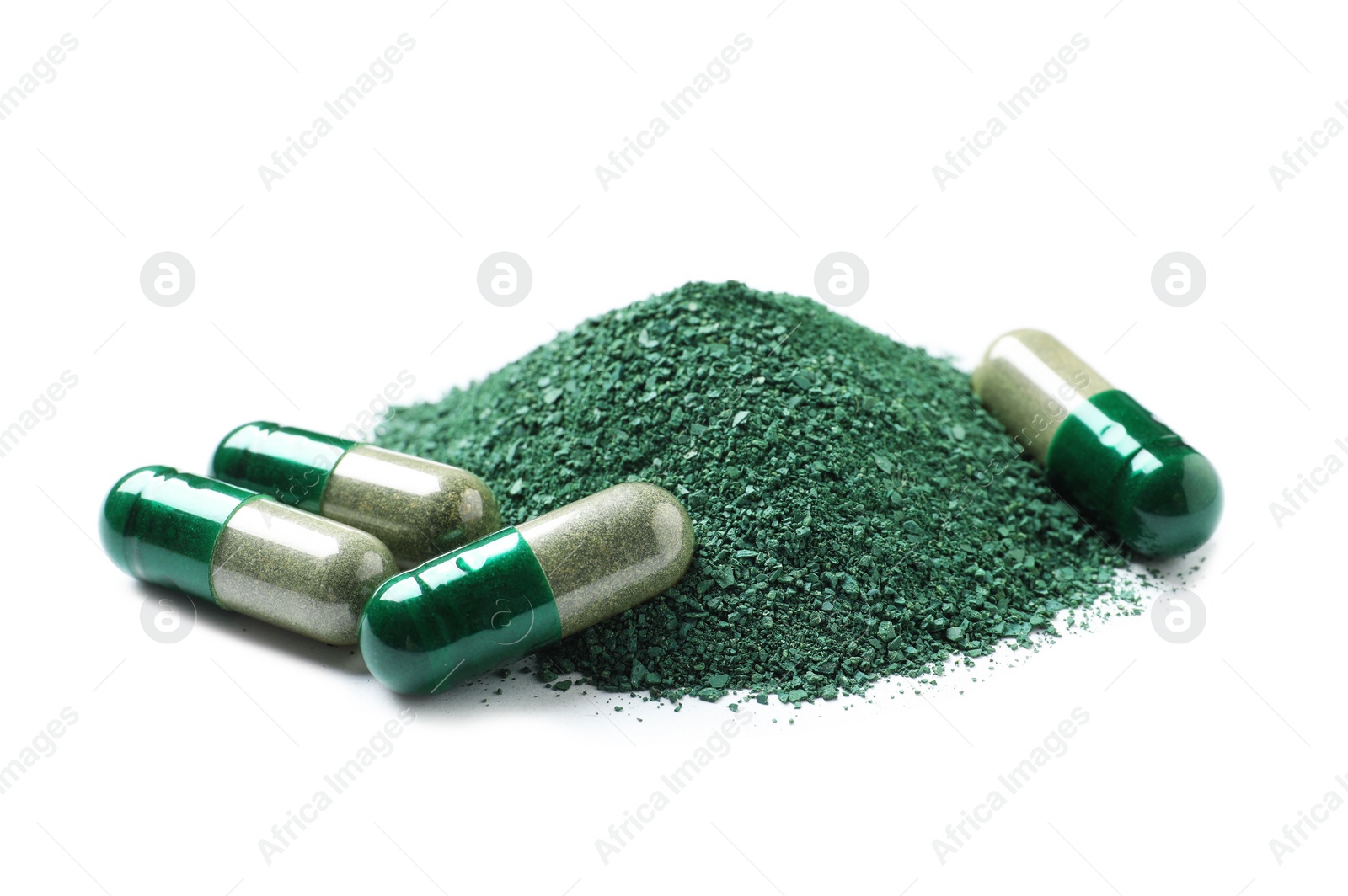 Photo of Pile of spirulina powder and pills on white background