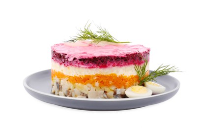 Photo of Herring under fur coat salad isolated on white. Traditional Russian dish