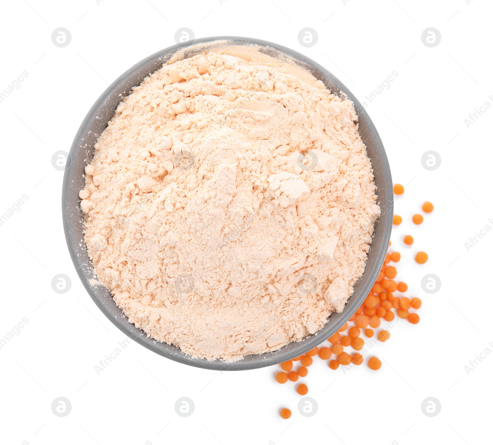 Photo of Lentil flour in grey bowl and seeds isolated on white, top view