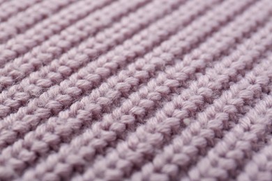 Photo of Beautiful violet knitted fabric as background, closeup