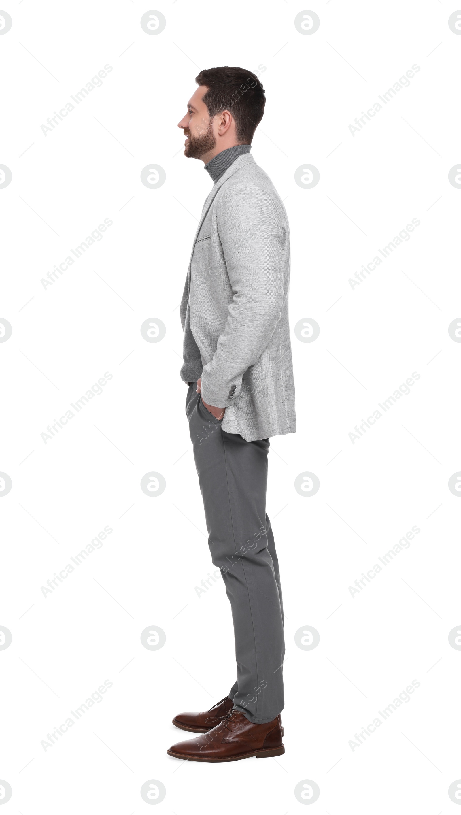 Photo of Handsome bearded businessman in suit on white background