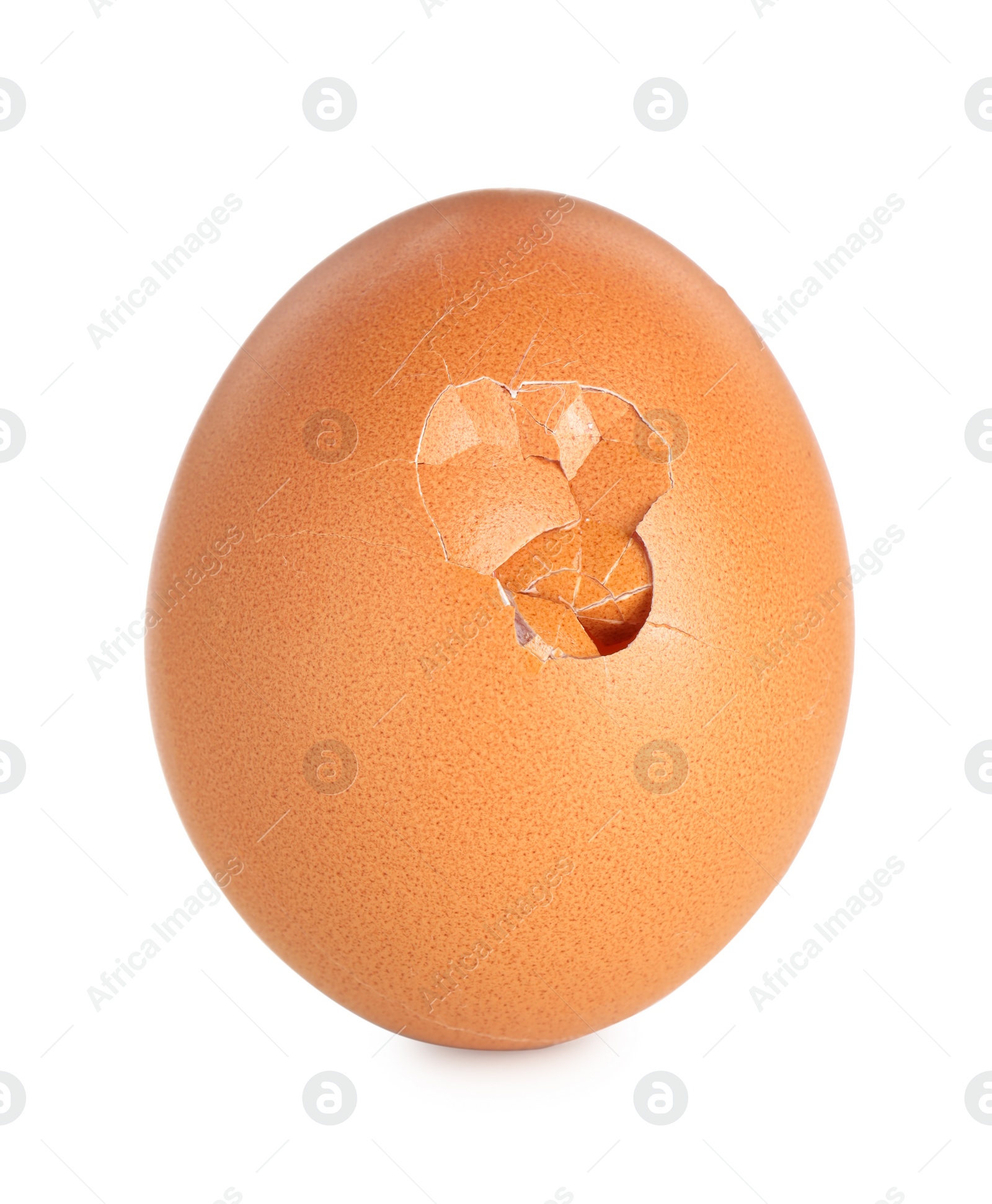 Photo of One cracked chicken egg isolated on white