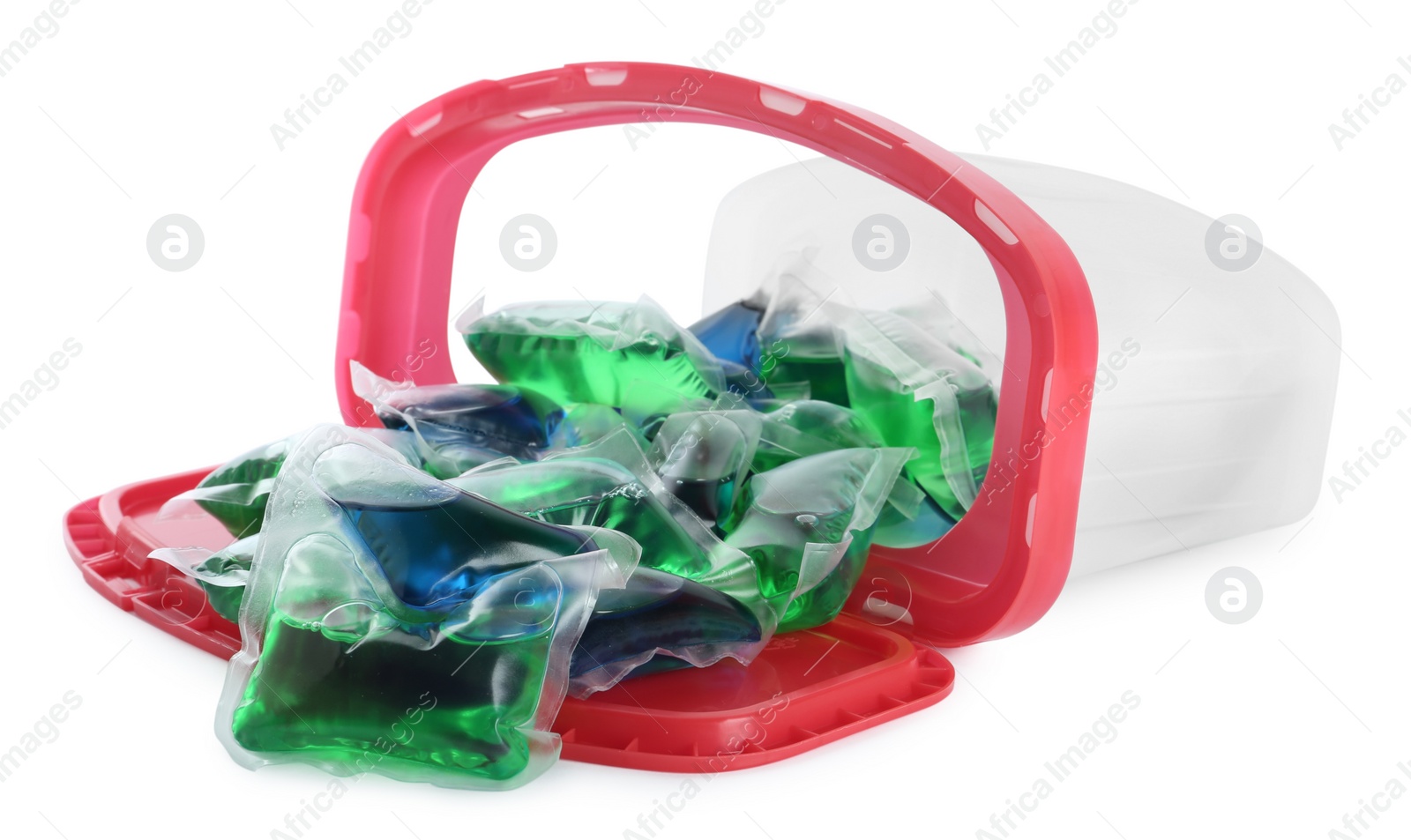 Photo of Overturned box with laundry capsules on white background