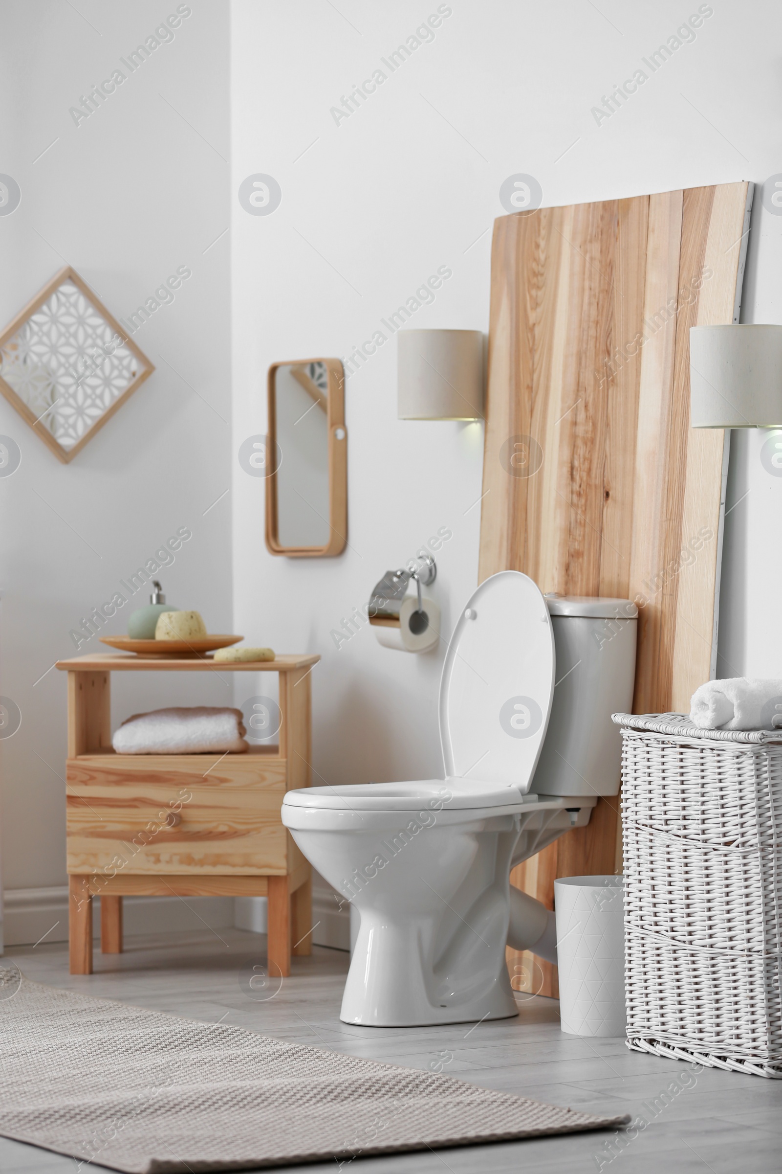 Photo of Toilet bowl in modern bathroom interior