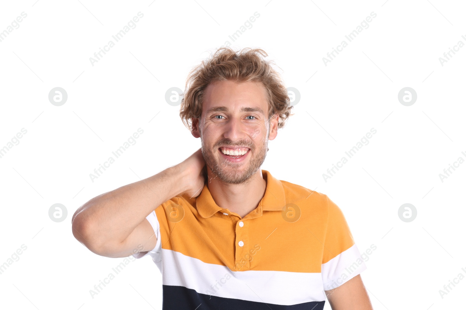 Photo of Handsome young man laughing on white background