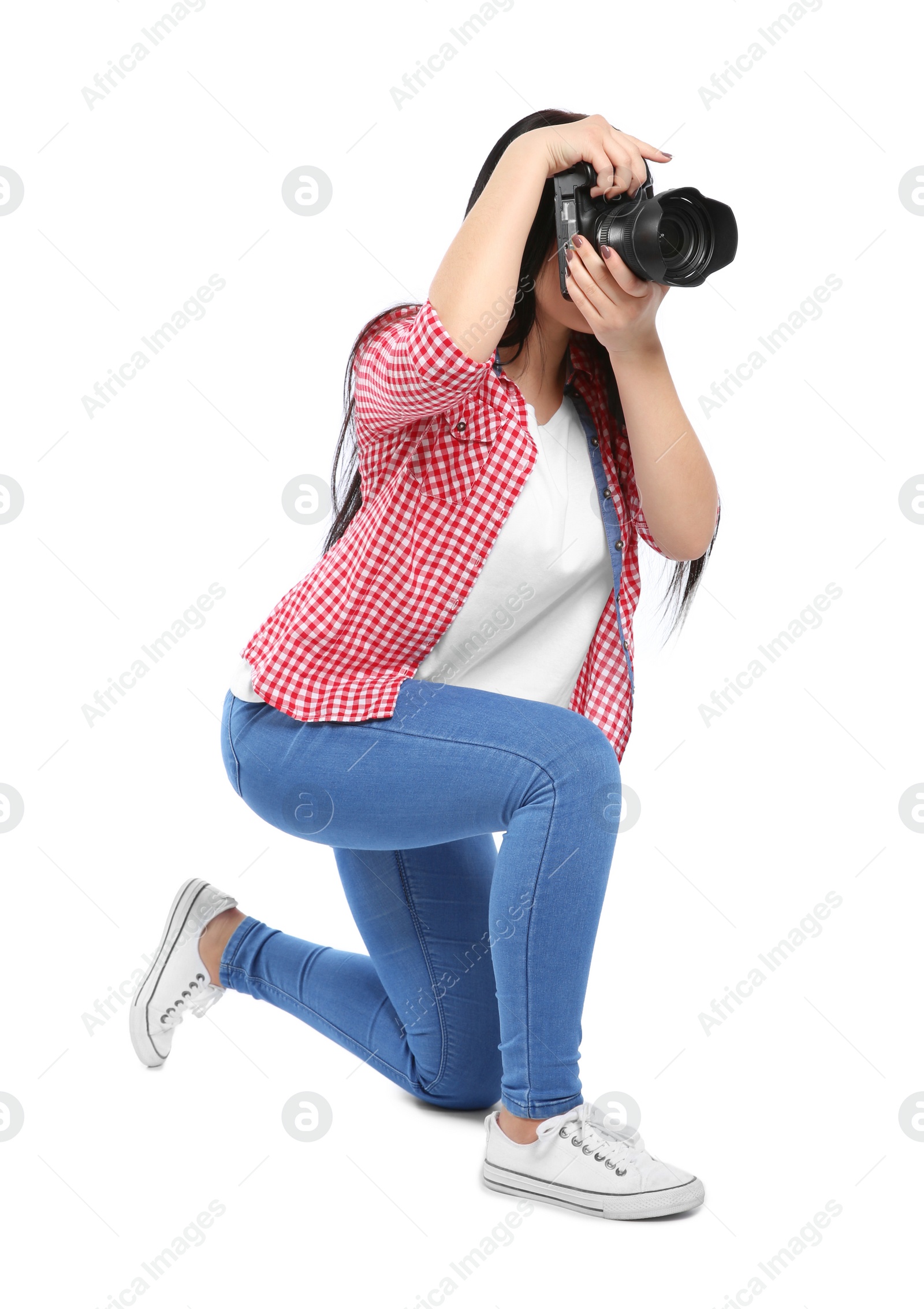 Photo of Female photographer with professional camera on white background