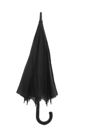 Photo of One closed black umbrella isolated on white