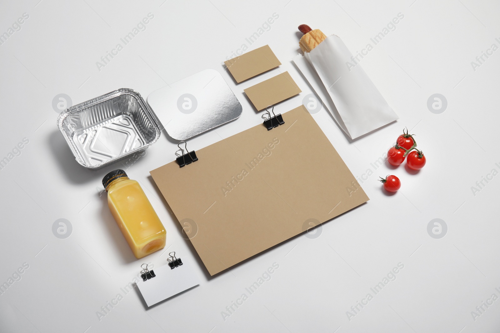 Photo of Composition with items for mock up design on light background. Food delivery service