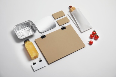 Photo of Composition with items for mock up design on light background. Food delivery service