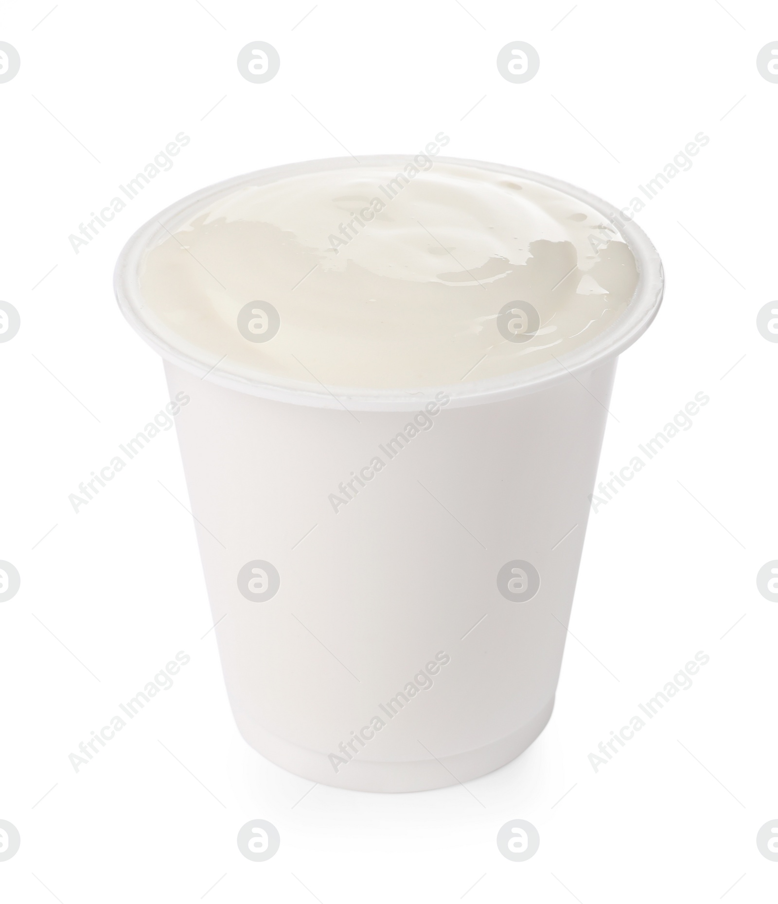 Photo of Delicious organic yogurt in plastic cup isolated on white