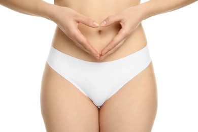 Gynecology. Woman in underwear making heart with her hands on white background, closeup