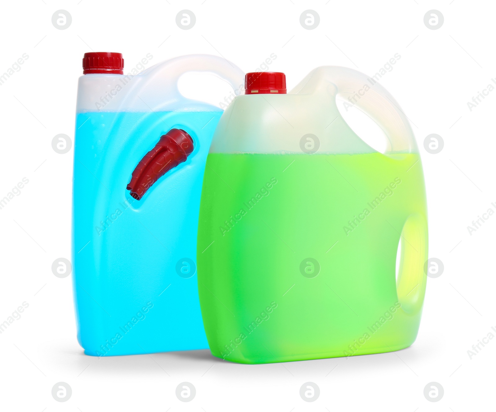 Photo of Plastic canisters with different liquids for car on white background