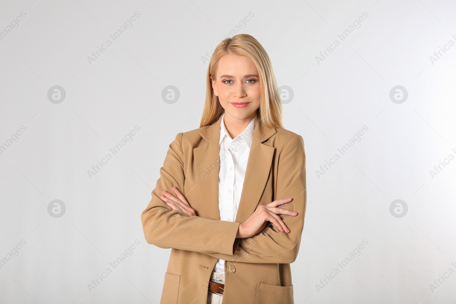 Photo of Portrait of young businesswoman on white background