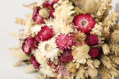 Photo of Beautiful bouquet of dry flowers on white background, closeup