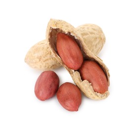 Photo of Fresh unpeeled peanuts isolated on white. Healthy snack