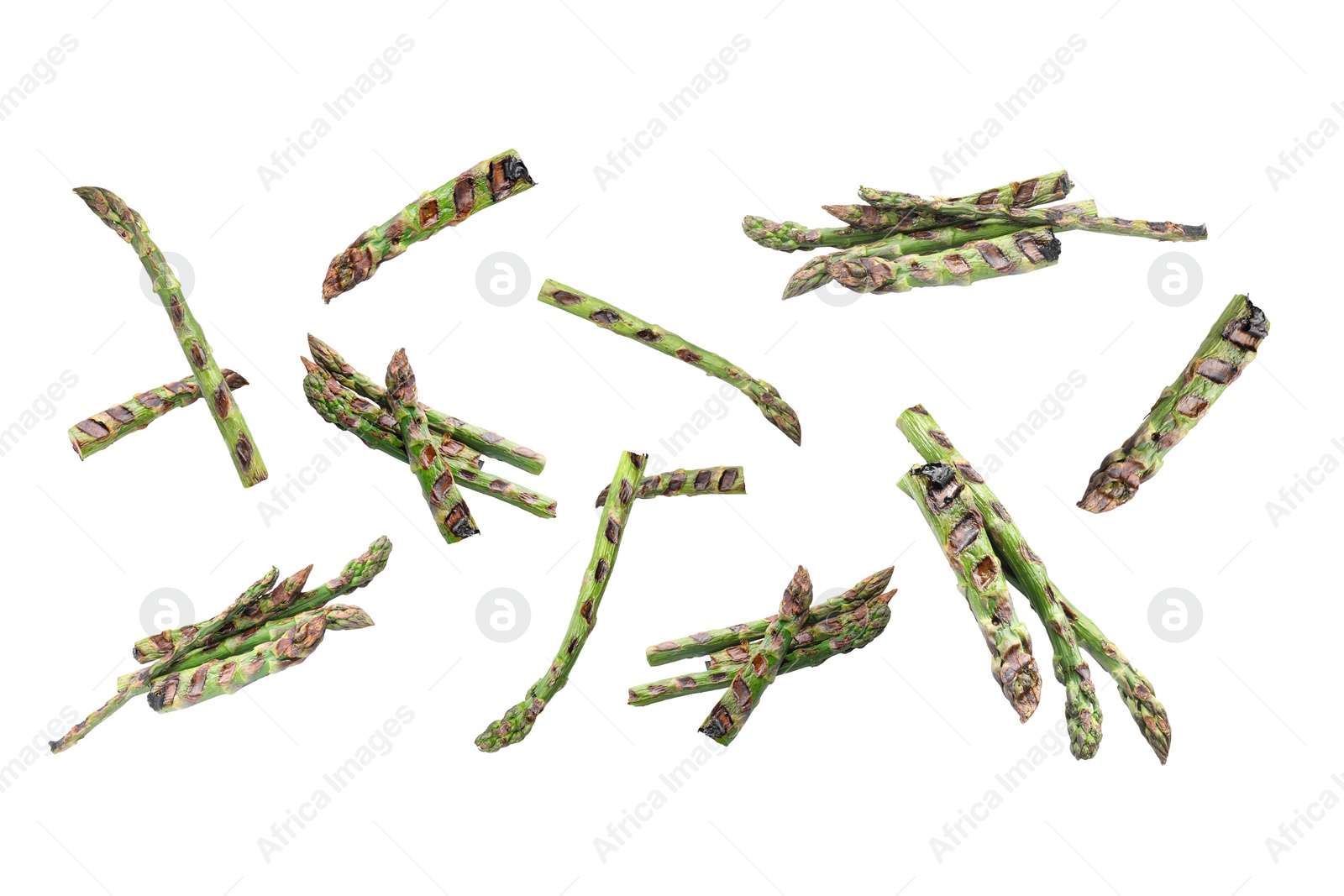 Image of Grilled asparagus spears in air on white background