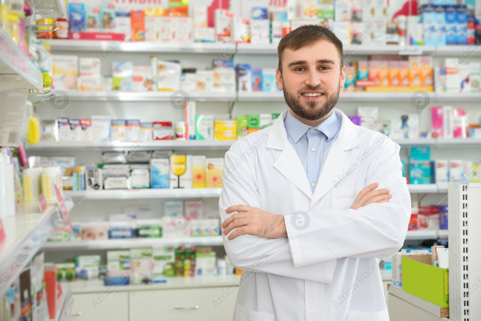 Photo of Portrait of professional pharmacist in modern drugstore