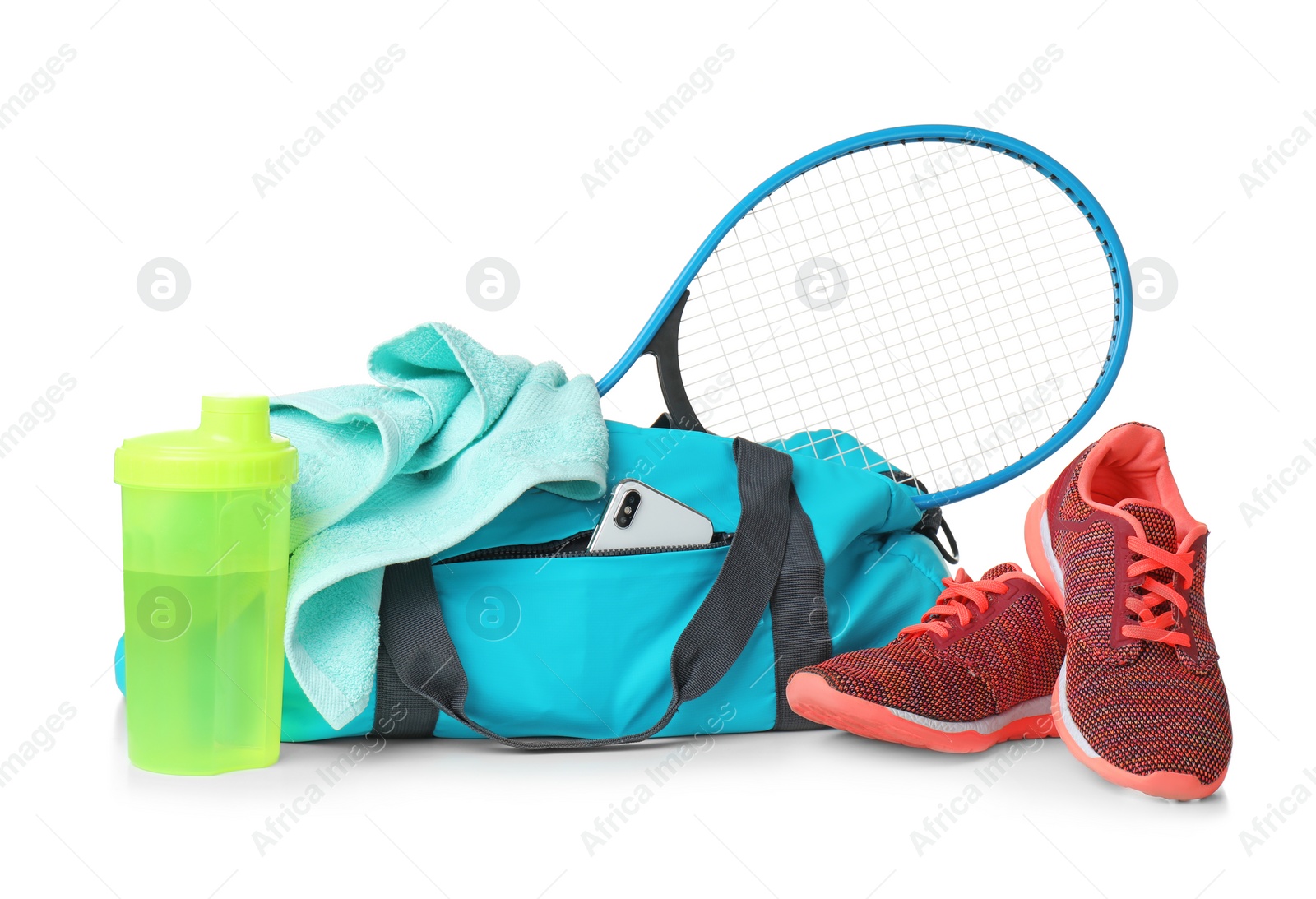 Photo of Sports bag and gym equipment on white background