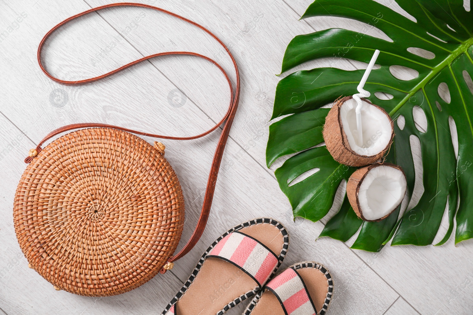 Photo of Flat lay composition with bamboo bag on wooden background