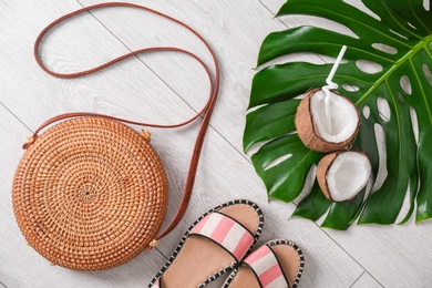 Photo of Flat lay composition with bamboo bag on wooden background