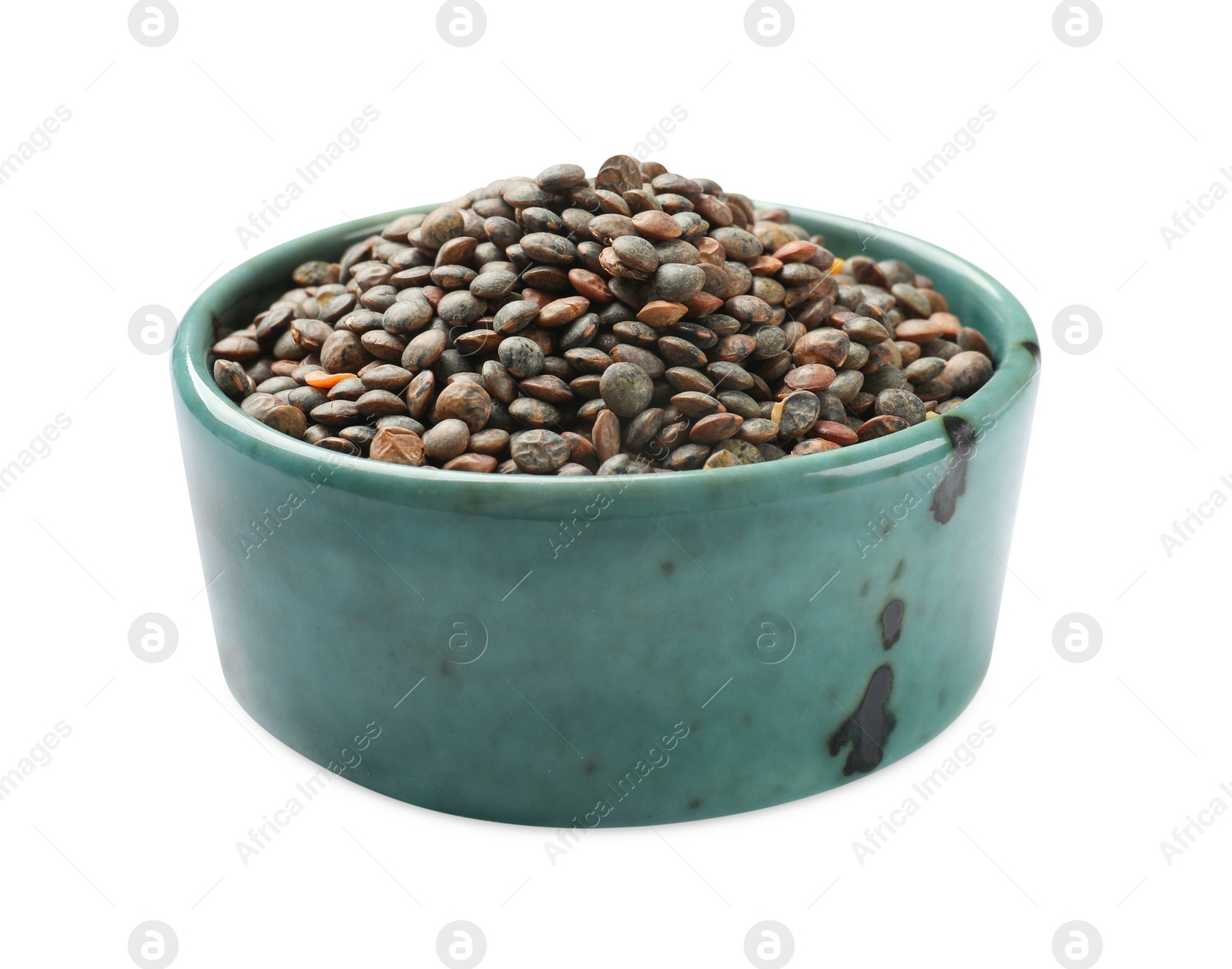 Photo of Raw lentils in bowl isolated on white