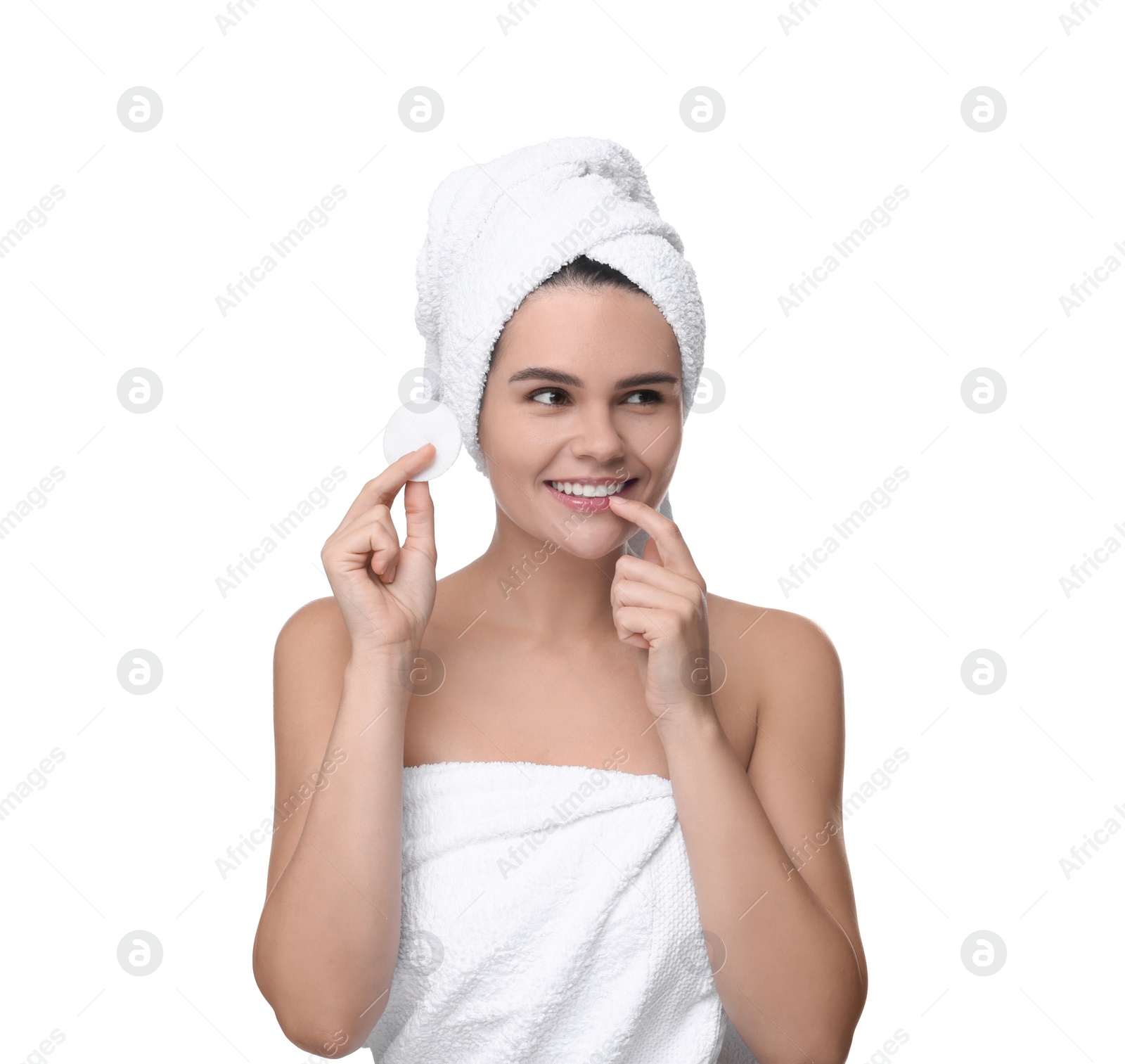 Photo of Young woman with cotton pad on white background