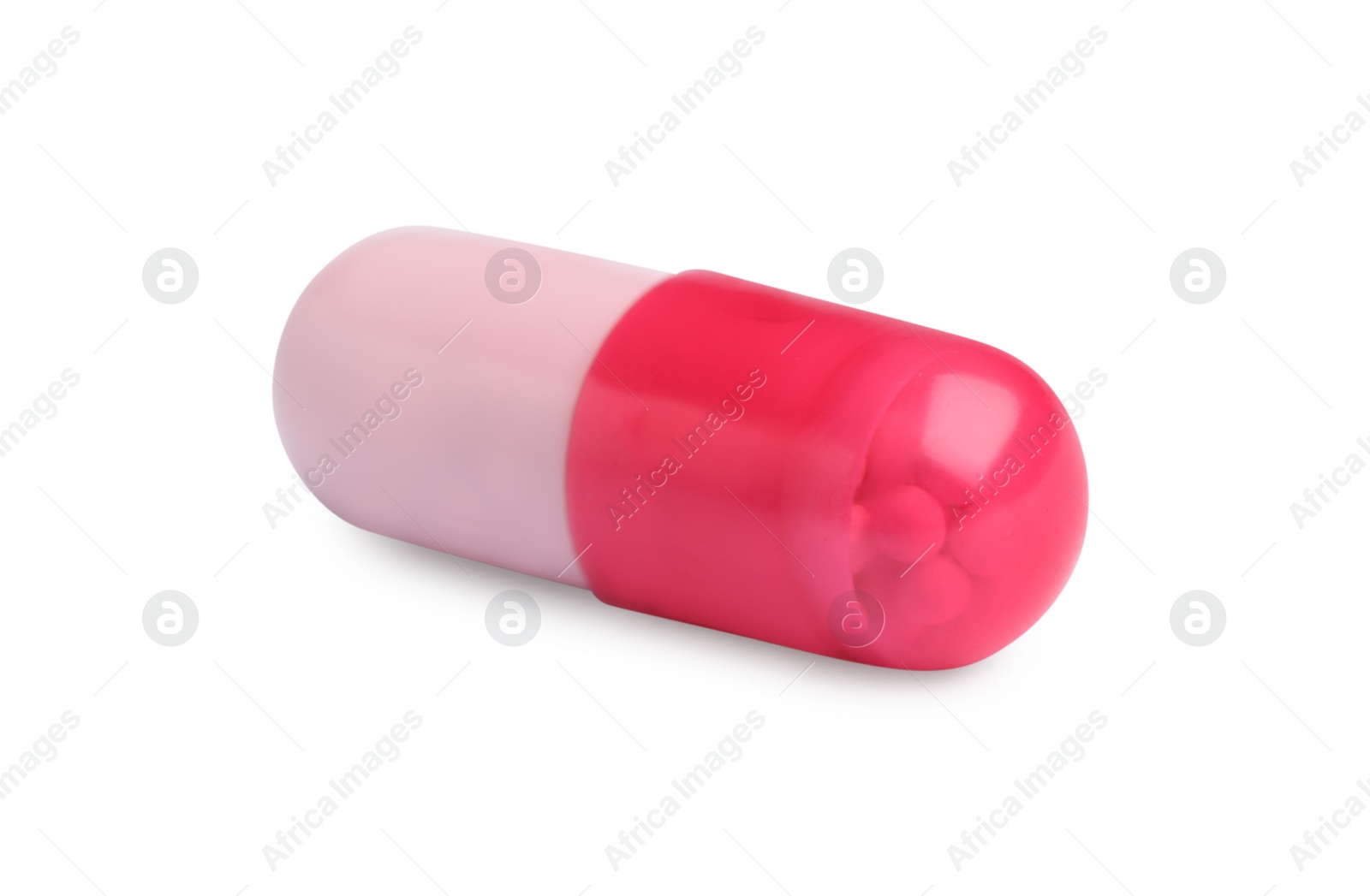 Photo of One pill on white background. Medicinal treatment