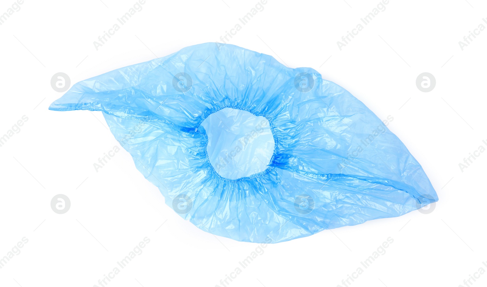 Photo of One blue medical shoe cover isolated on white, top view