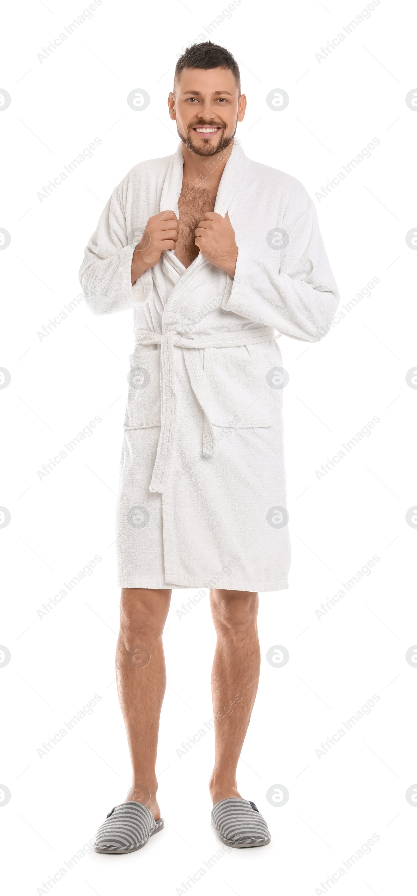 Photo of Handsome man wearing bathrobe on white background