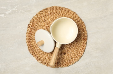 Photo of Saucepan and lid on white table, flat lay. Cooking utensil